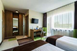 Отель Mazurski Raj - Hotel, Marina & Spa Ручане-Нида Стандартный двухместный номер с 1 кроватью или 2 отдельными кроватями и балконом-2
